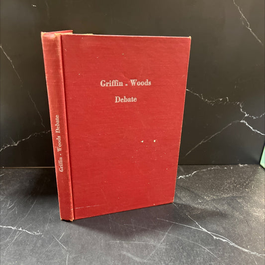 a debate on the subject of eternal salvation book, by elder g. e. griffin, guy n. woods, 1958 Hardcover image 1