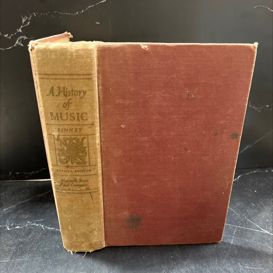 a history of music book, by Theodore M. Finney, 1947 Hardcover, Vintage, Heavily Used image 1