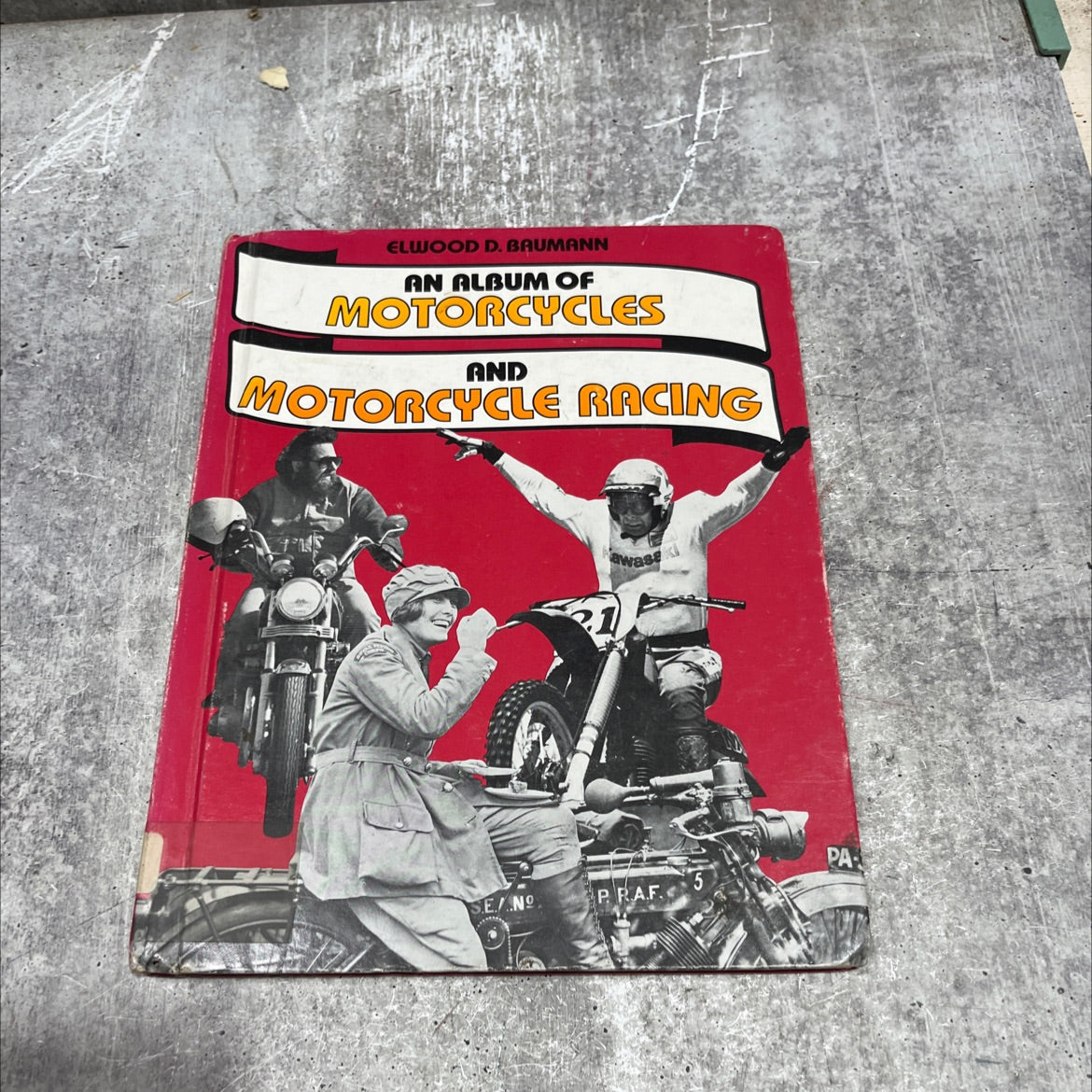 an album of motorcycles and motorcycle racing book, by elwood d. baumann, 1982 Hardcover image 1