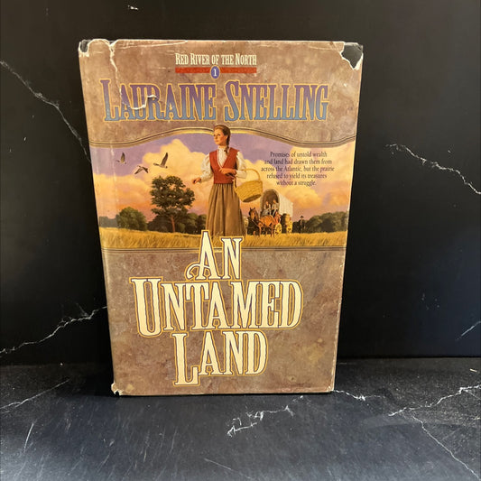 an untamed land book, by lauraine snelling, 1996 Hardcover image 1