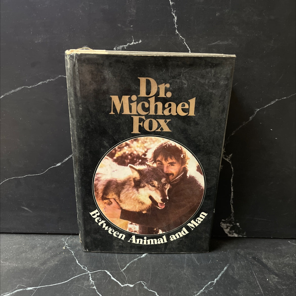 behavior x between animal and man book, by Dr. Michael W. Fox, 1976 Hardcover image 1