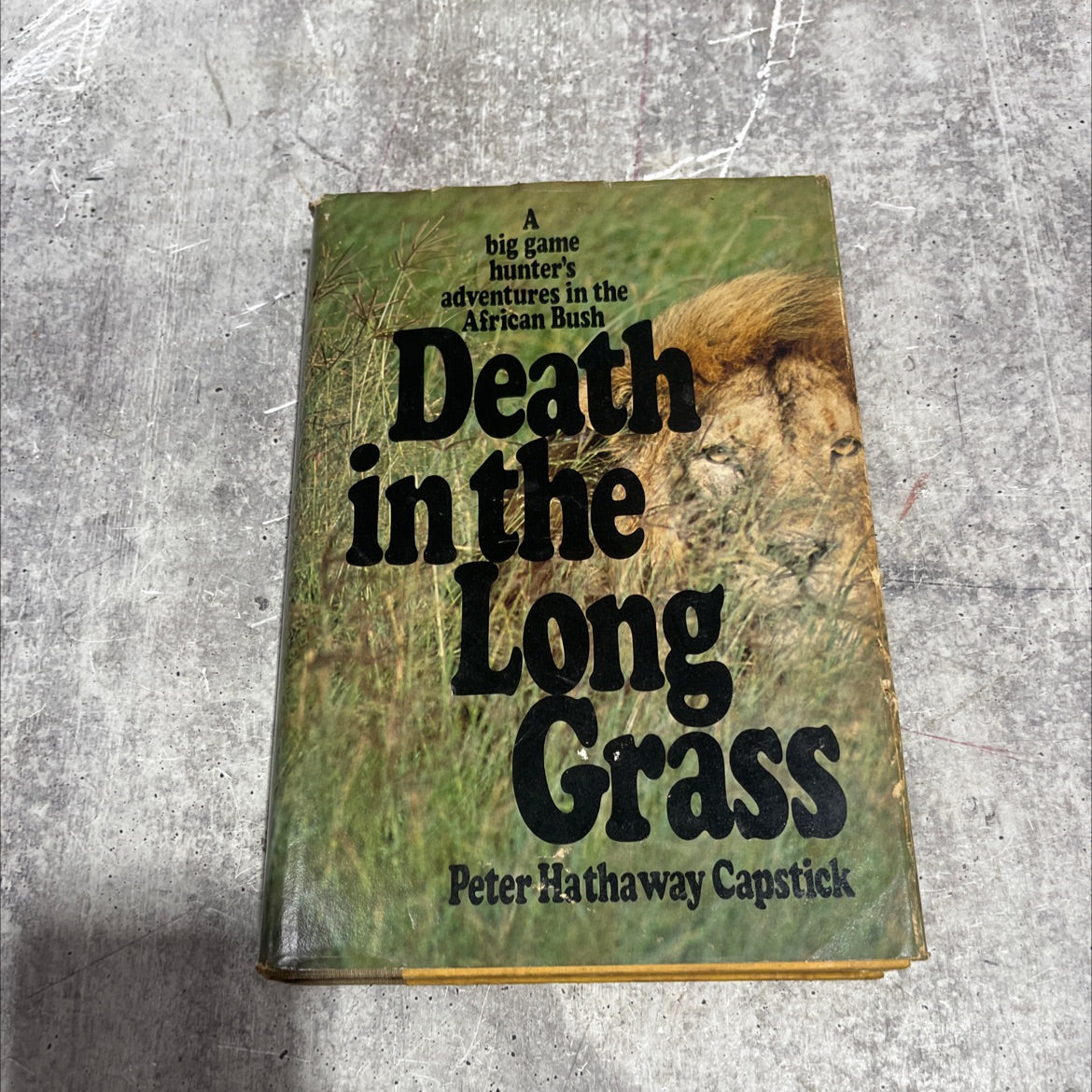 death in the long grass book, by peter hathaway capstick, 1977 Hardcover image 1