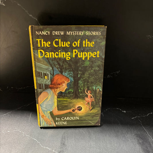 the clue of the dancing puppet book, by carolyn keene, 1962 Hardcover image 1
