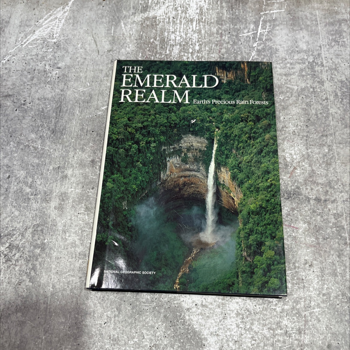 the emerald realm earth's precious rain forest book, by unknown, 1990 Hardcover image 1